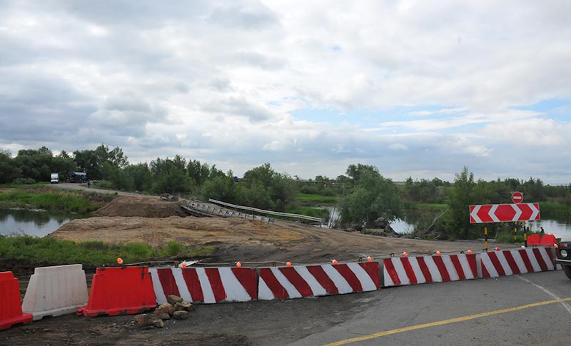 50 метров без малого. Новый мост будет длиннее и выше старого