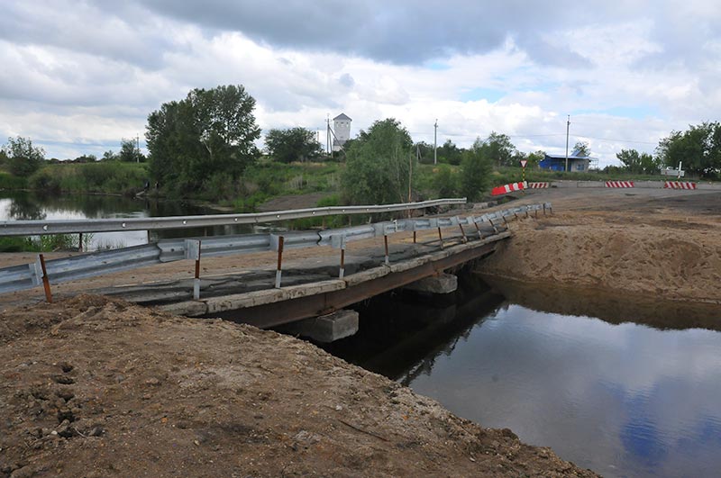50 метров без малого. Новый мост будет длиннее и выше старого